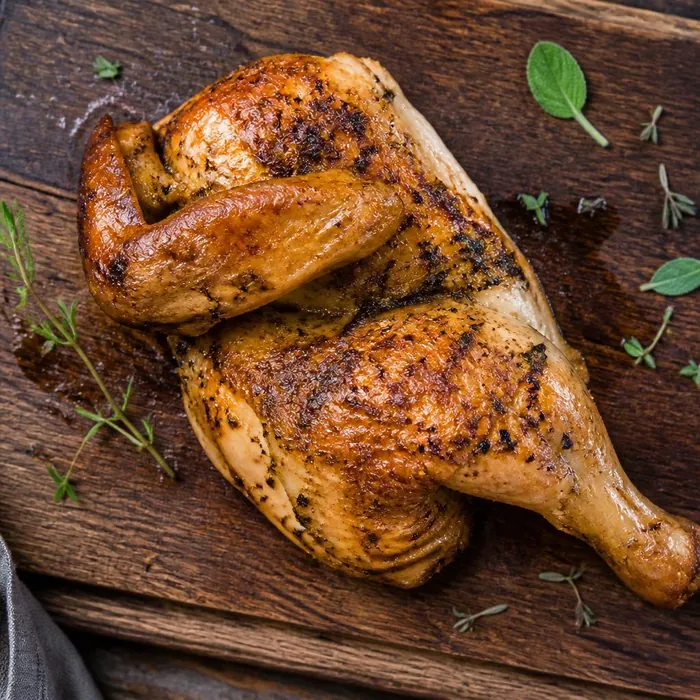 Pollo a metà